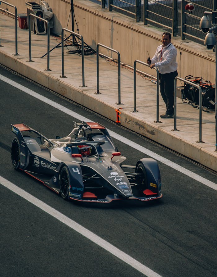 A dynamic Formula E race car on the track in Ciudad de México, CDMX, México.